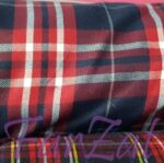 Material uniforme scolare